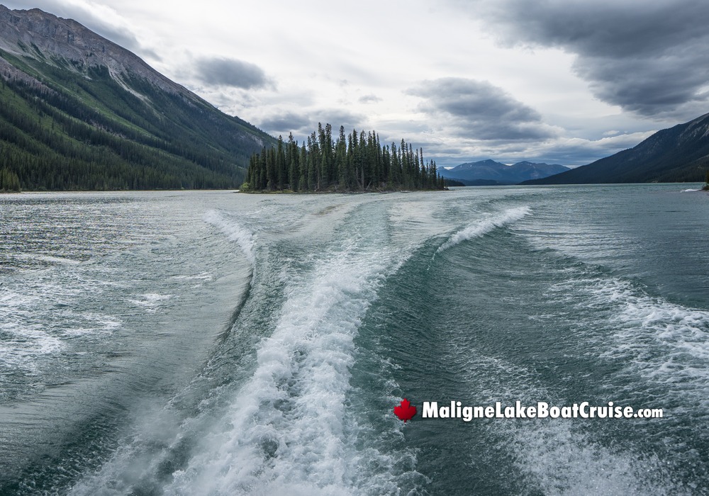 Beautiful Landscape behind Boat Cruise Wake