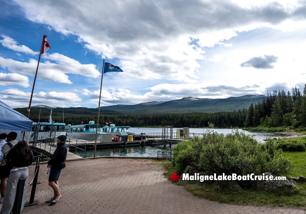 Visitors Waiting to Board Maligne Boat Cruise on Walkway